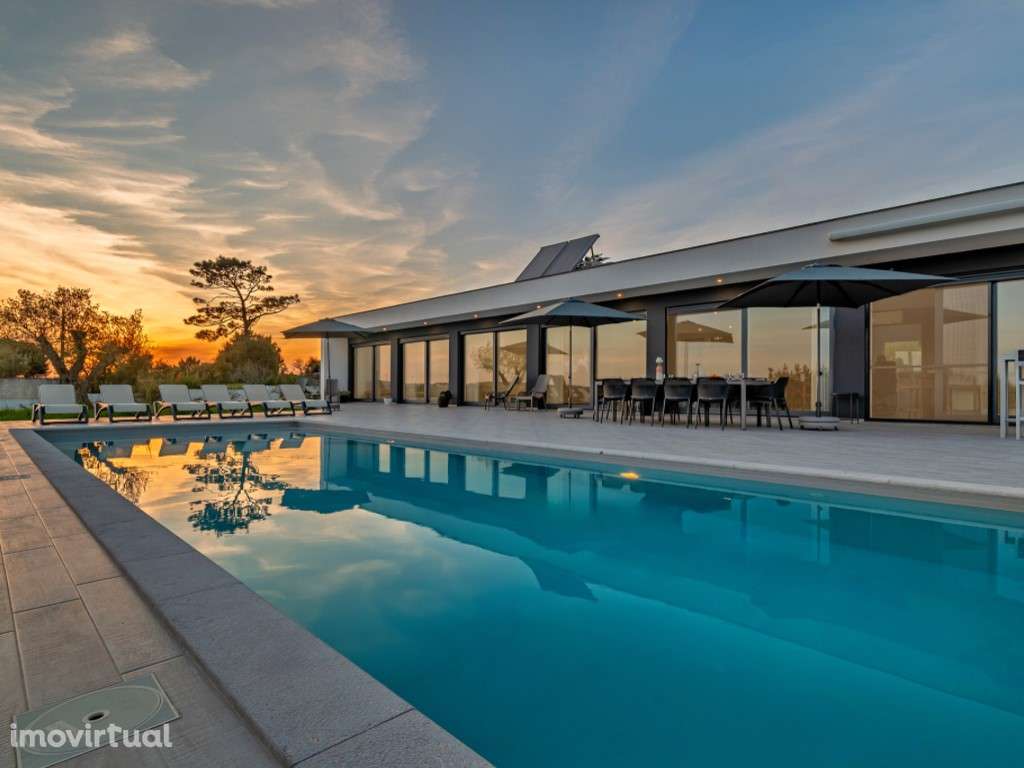 Moradia de luxo rodeada pela natureza inserida em 6920m² de terreno - Grande imagem: 3/60