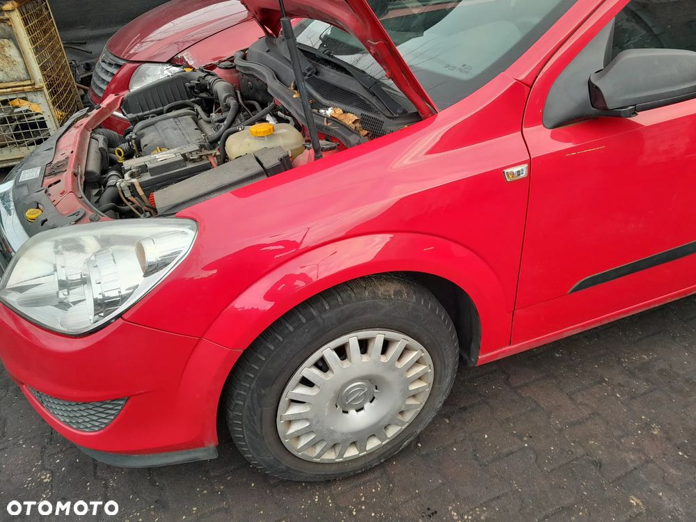 Błotnik przedni lewy OPEL Astra H 04-14r. Z50B - 2