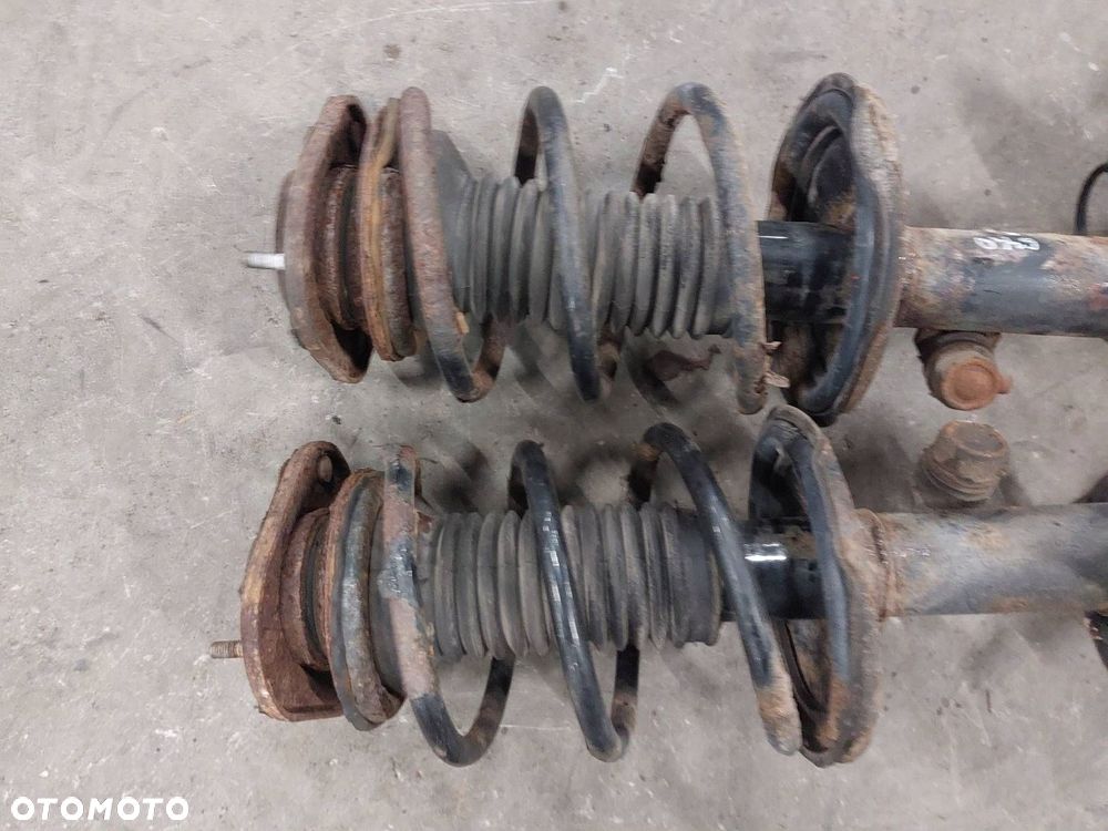 AMORTYZATOR ZWROTNICA LEWY + PRAWY PRZÓD COROLLA VERSO II 2.0 D4D - 6