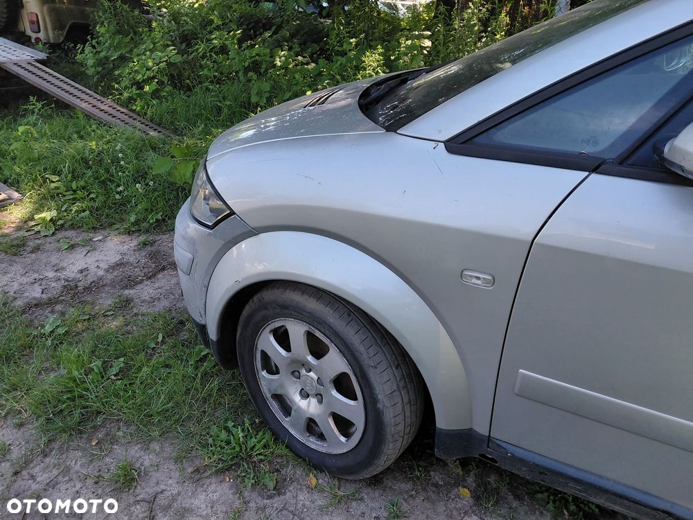 części  AUDI A2 1.4TDI 55kW 2004r.5 drzwi hatchback BŁOTNIK przód prawy lewy LY7W - 2