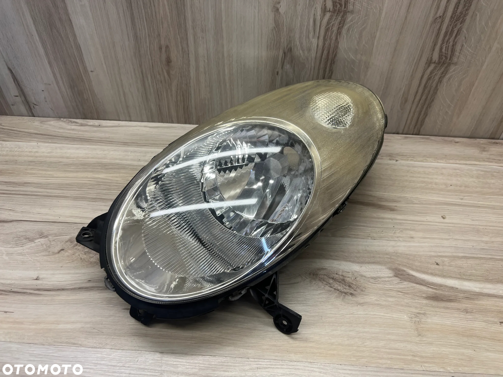 LAMPA REFLEKTOR LEWY NISSAN MICRA K12 - 2