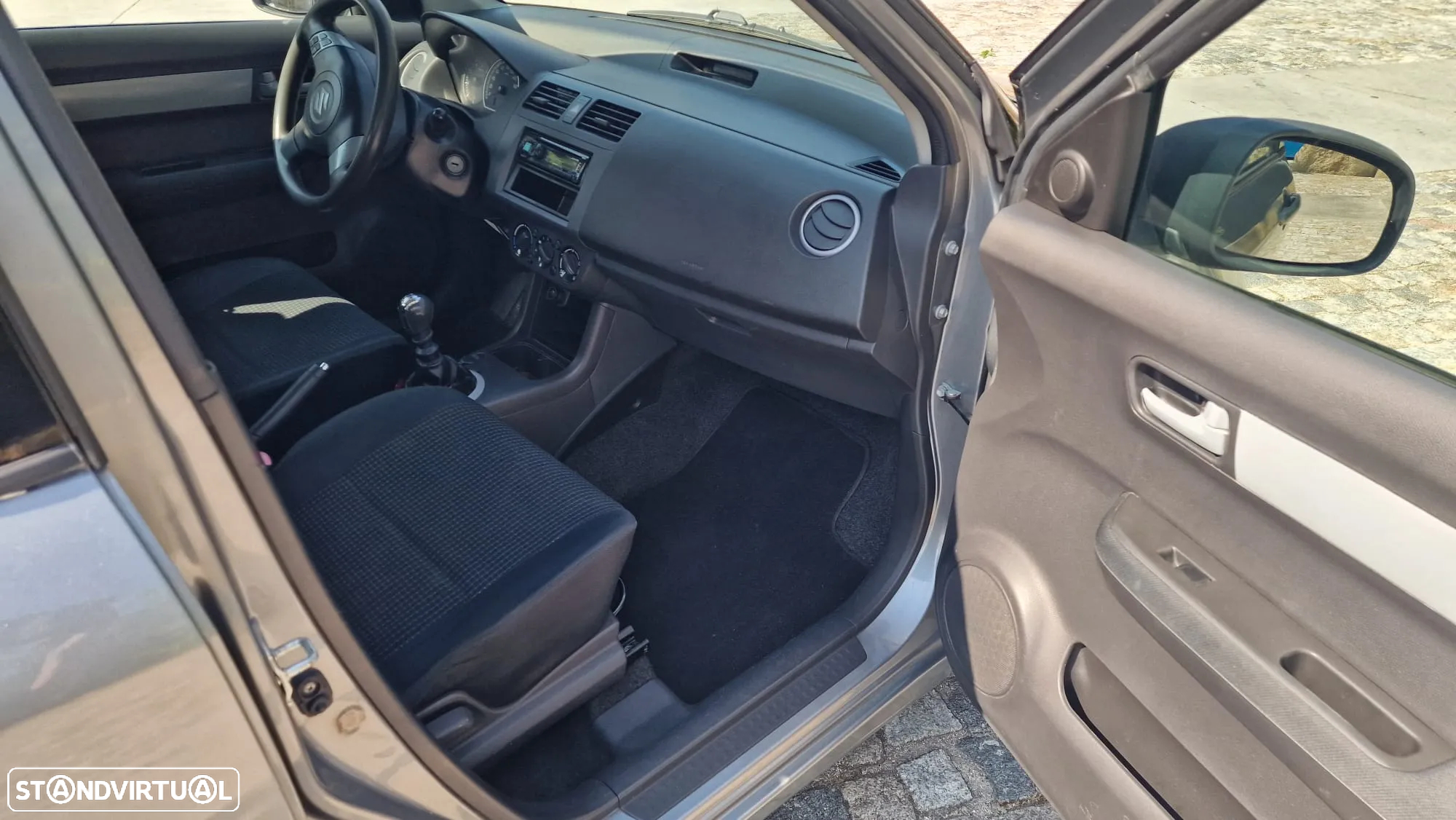 Suzuki Swift 1.3 DDiS GLX - 8