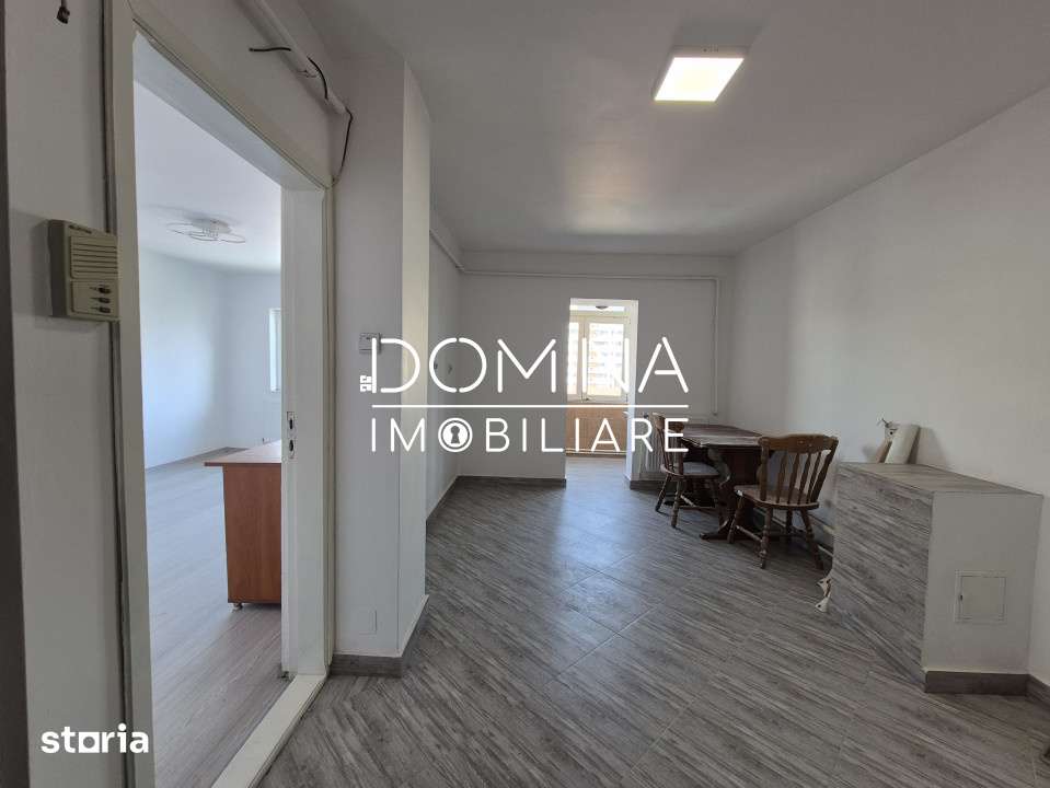Vanzare apartament central, 3 camere+boxa, situat in Targu Jiu, strada — fotografia 3