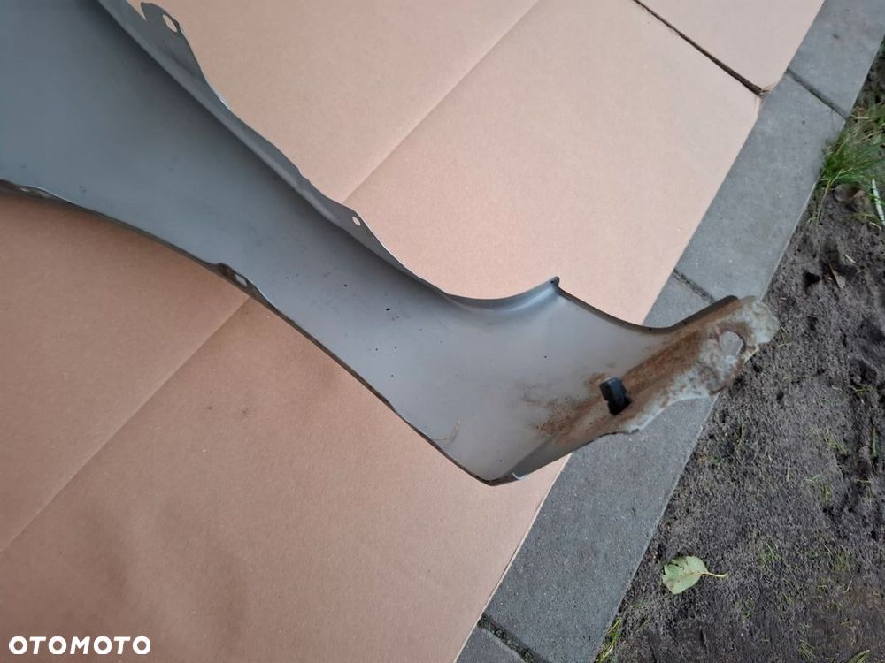 BŁOTNIK PRZEDNI TOYOTA YARIS II ORYGINAŁ - 9