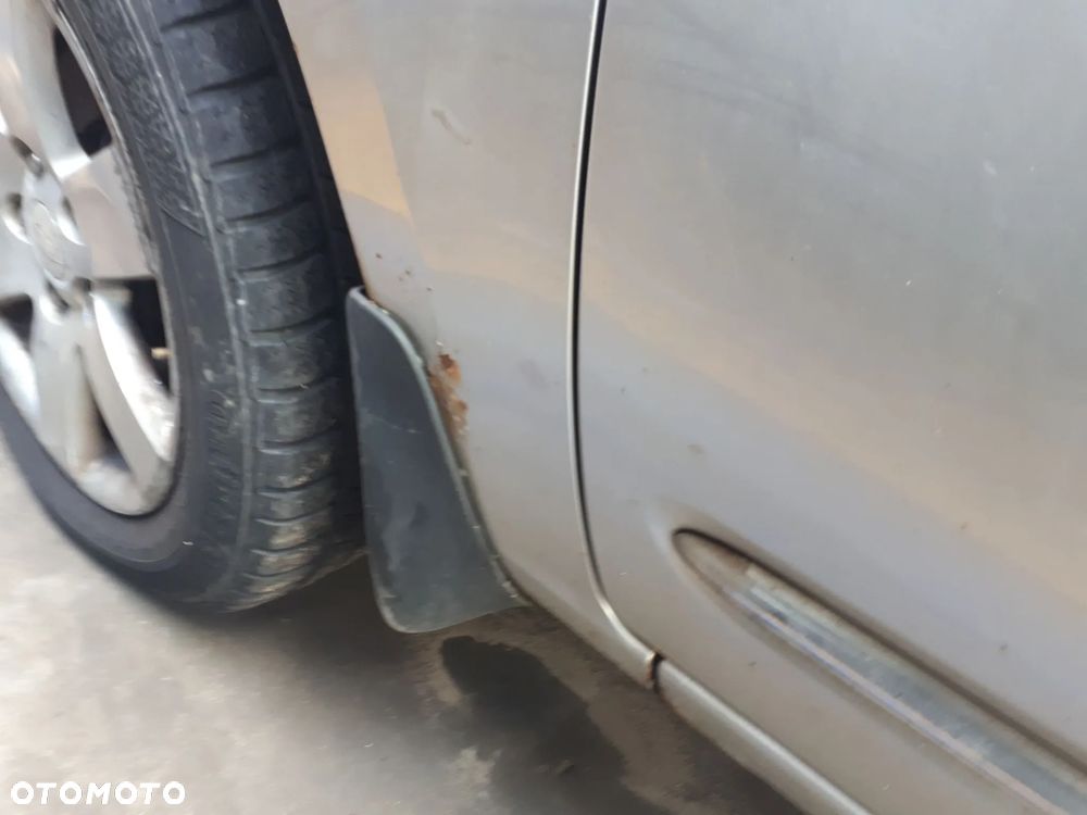 KIA CARENS III 06-11 OSŁONA PRZECIWSŁONECZNA PRAWA LEWA  7S - 23