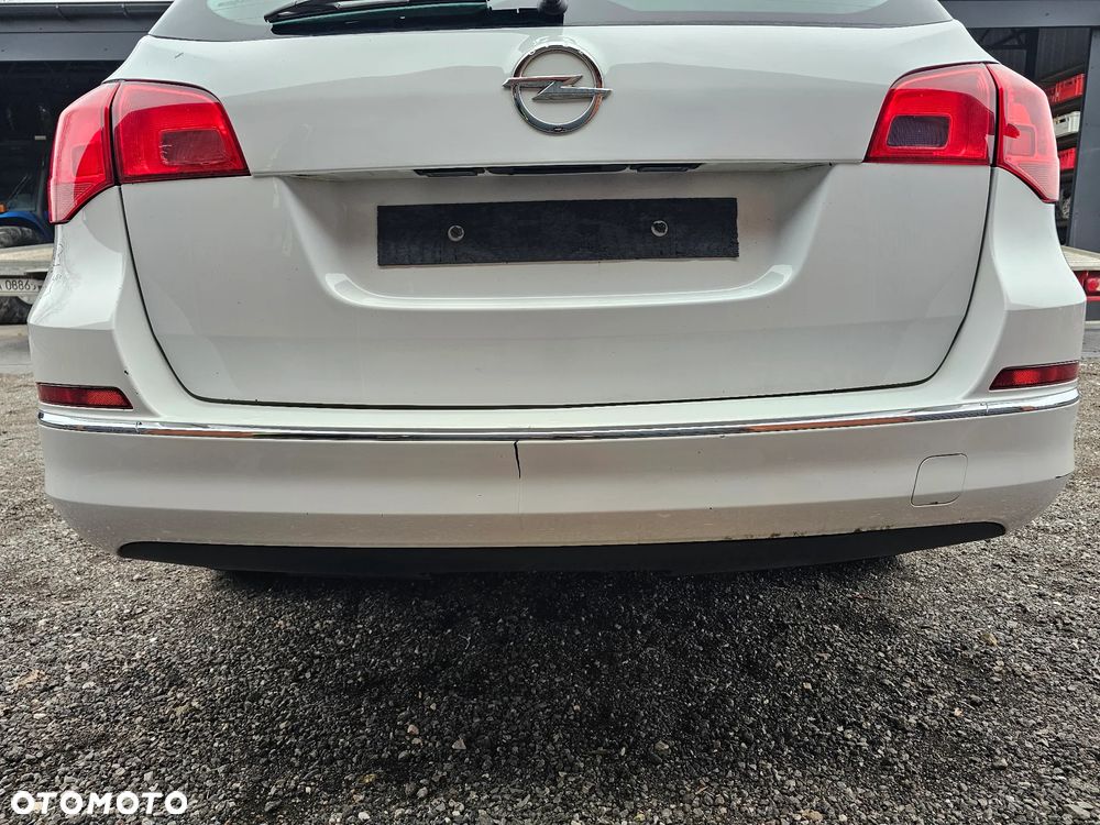 ZDERZAK TYŁ TYLNY OPEL ASTRA J KOMBI Y40R PO LIFT KOMPLETNY - 1