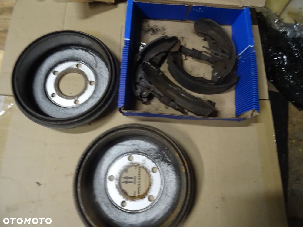 FORD MAVERICK TYL BEBNY HAMULCOWE OKLADZINY KOMPLET MAZDA TRIBUTE CZESCI ROZNE