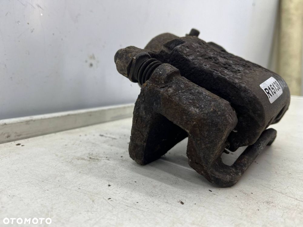 Zacisk hamulcowy Chevrolet Nubira III J200 05-12r. 2.0 cdi diesel lewy przedni jarzmo lewy przód - 3