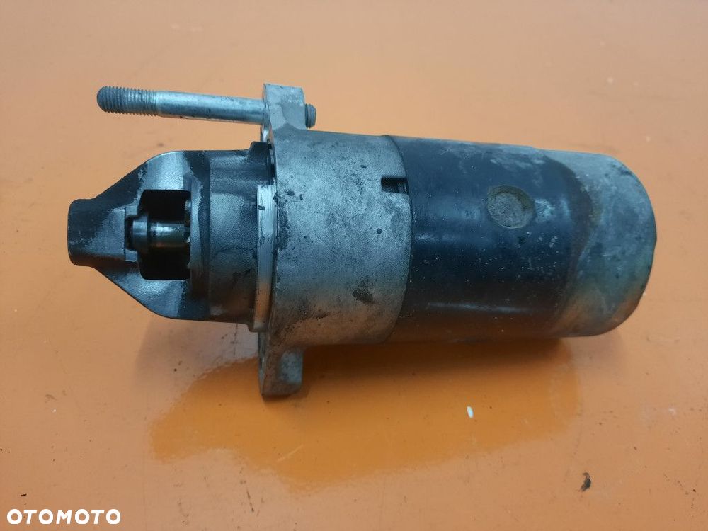 SUZUKI SWIFT IV MK6 04-10 ROZRUSZNIK 31100-86G00 M13A - 1
