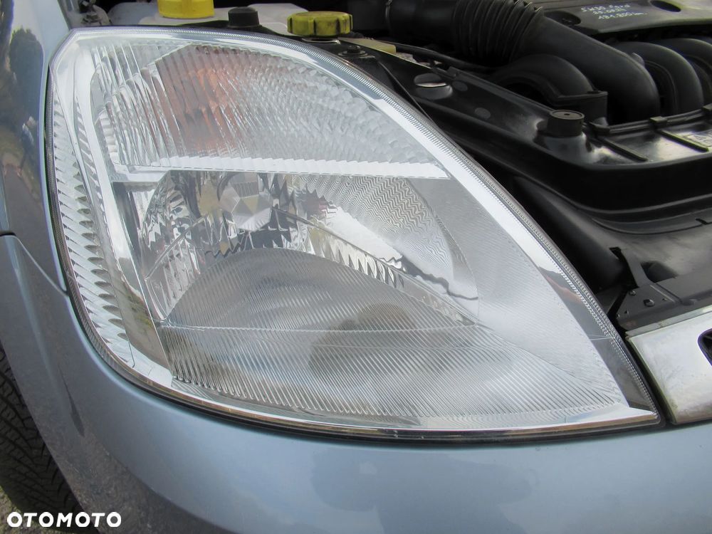 Ford Fiesta 1.4 Ghia - 40