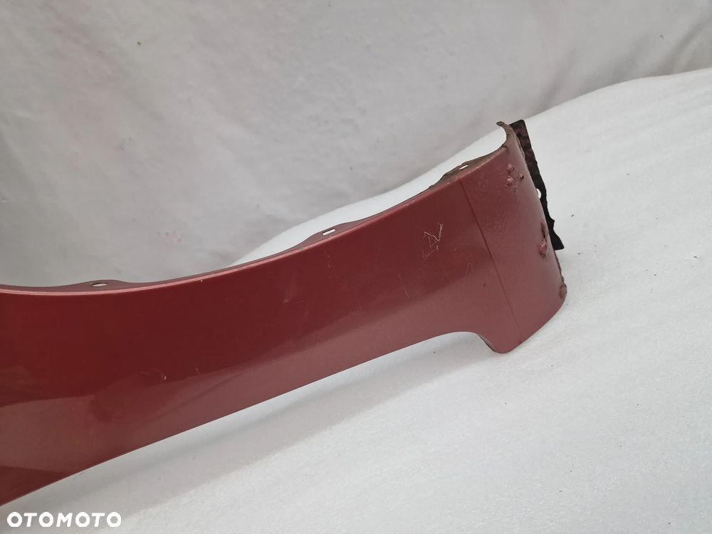 DAIHATSU SIRION II 05- PRAWY BŁOTNIK PRZEDNI PRZÓD , RÓŻOWY , NR AUKCJI BŁ88 - 14