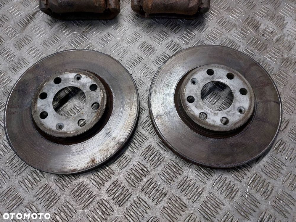 TARCZE HAMULCOWE PRZÓD + KLOCKI + ZACISKI OPEL CORSA D 1.3 CDTI - 2