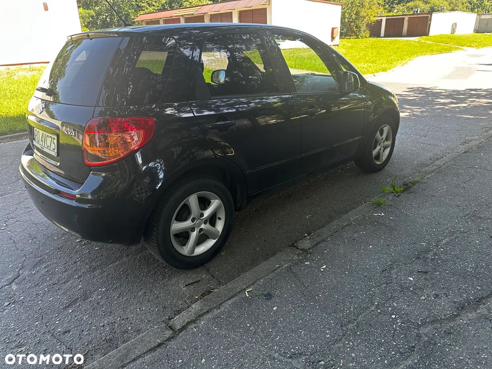 Suzuki SX4 1.6 GLX / Comfort - 4
