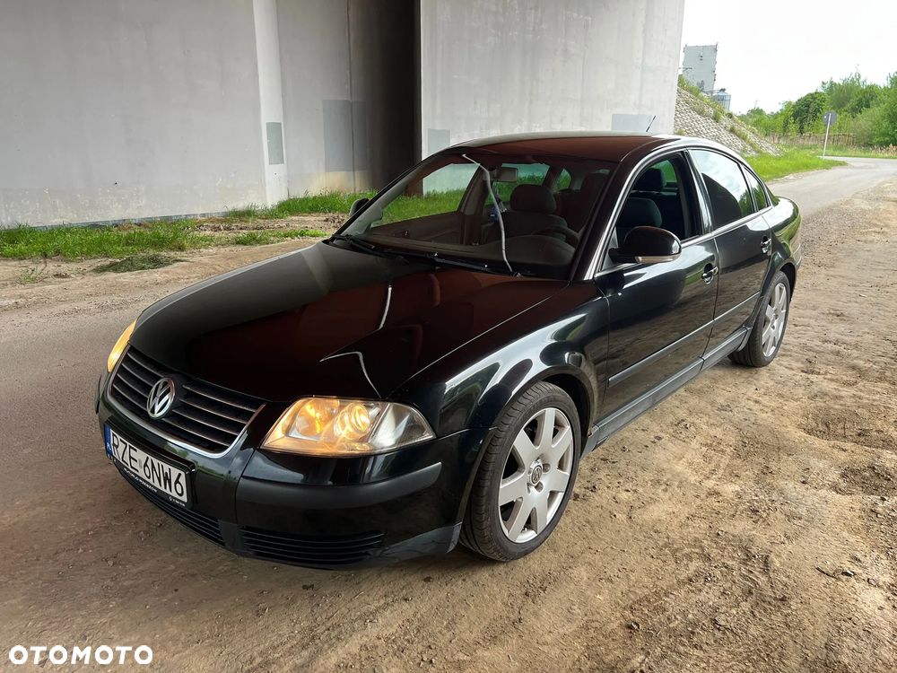 Volkswagen Passat 1.9 TDI Highline - 12