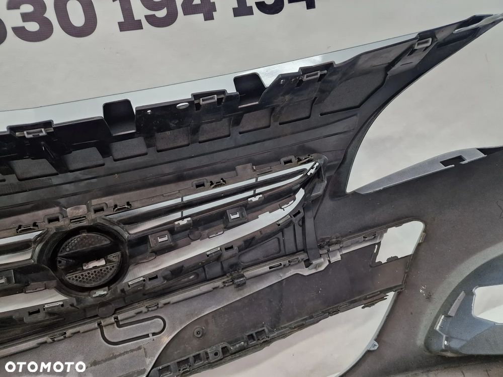 OPEL ASTRA IV LIFT 12- ZDERZAK PRZEDNI PRZÓD , NA SPRYSKI + ATRAPA / GRILL + HOKEJE , NR 13368660 , NR AUKCJI NZ1350 - 27