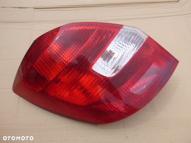 LAMPA LEWY TYŁ LEWA TYLNA SKODA FABIA II HB - 1