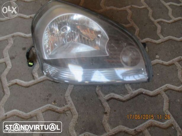 Farol kia sportage 2005 - 1