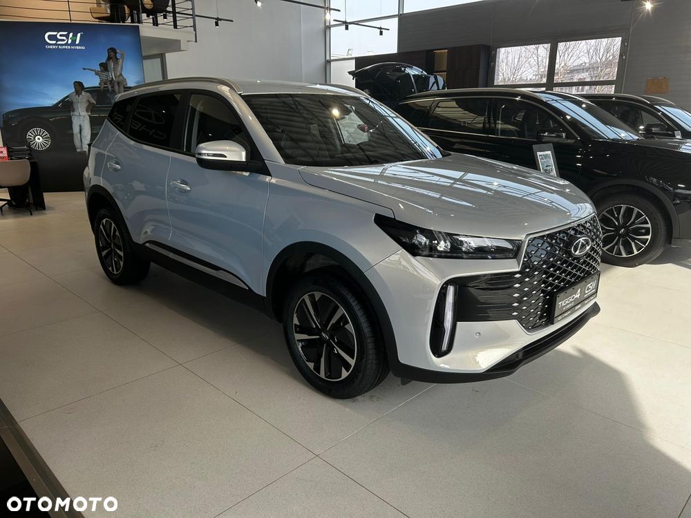 Chery Tiggo 4 1.5 T-GDI HEV Prestige DHT - 5