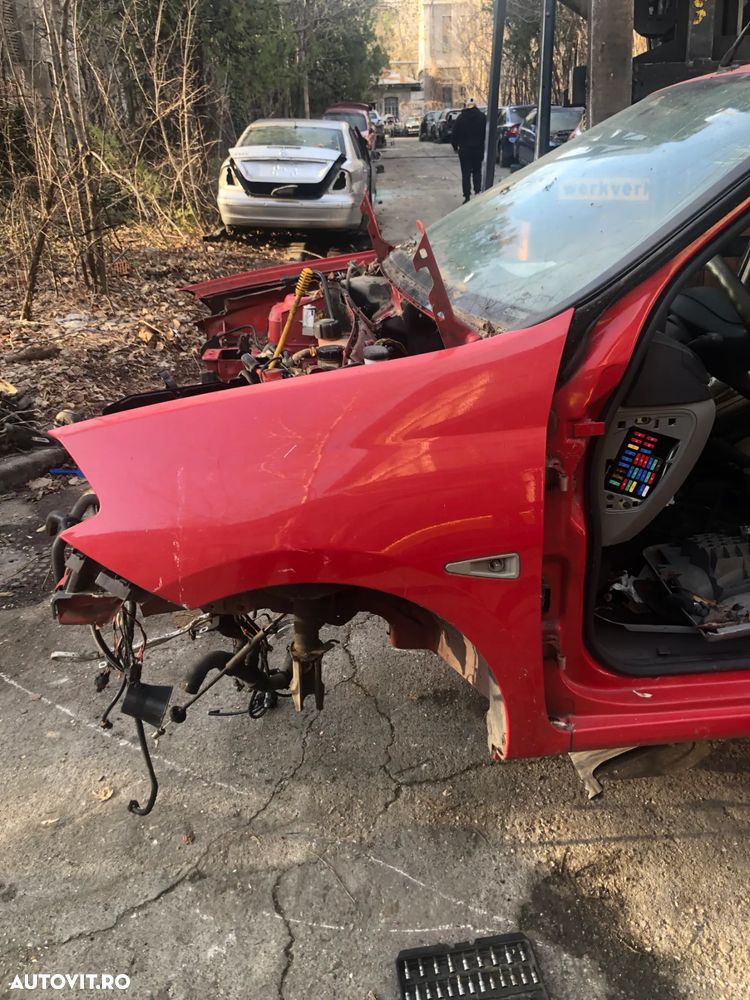 Aripa stanga fata Renault Clio Thalia 2011 rosu - 4