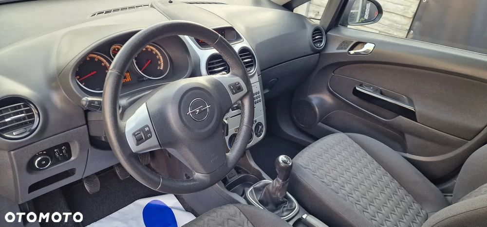 Opel Corsa 1.4 16V Active - 11