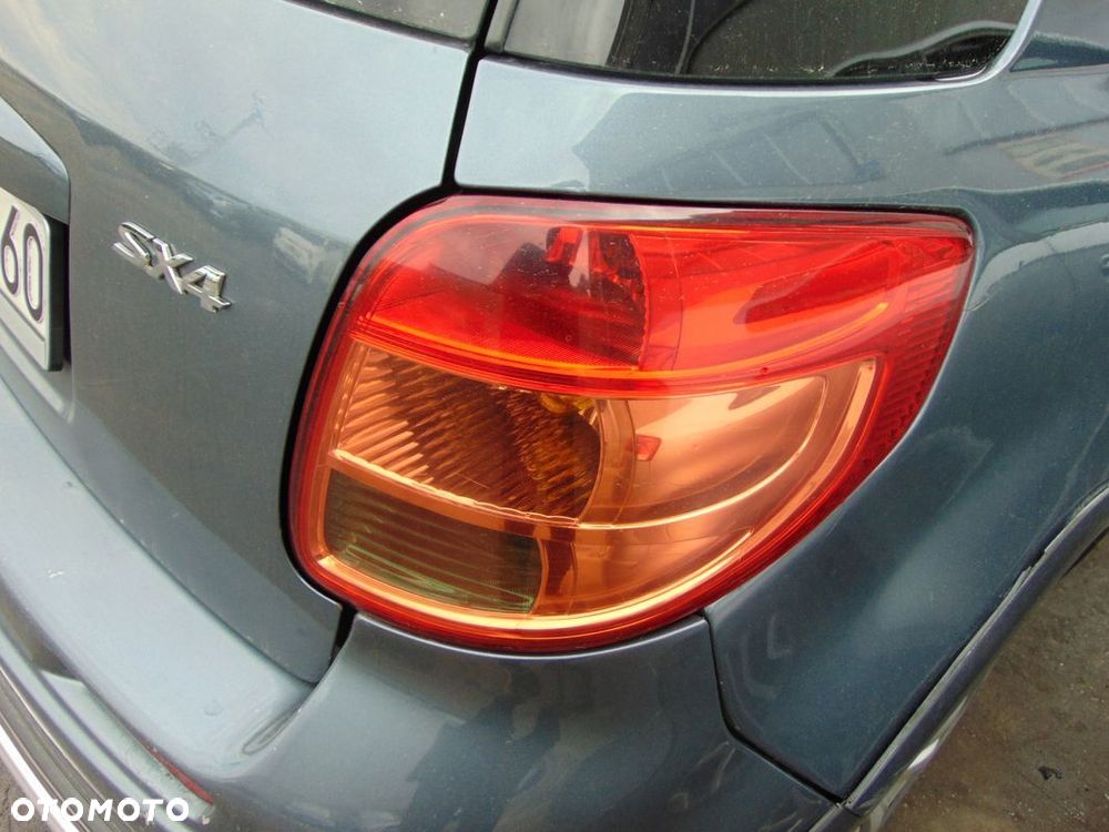 LAMPA PRAWA TYŁ TYLNA FIAT SEDICI SUZUKI SX4 EUROPA - 1