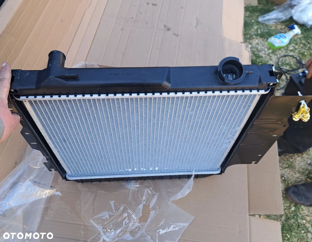 Chłodnica wody Jeep Wrangler YJ TJ 4.0 52040286 52007227 - 5