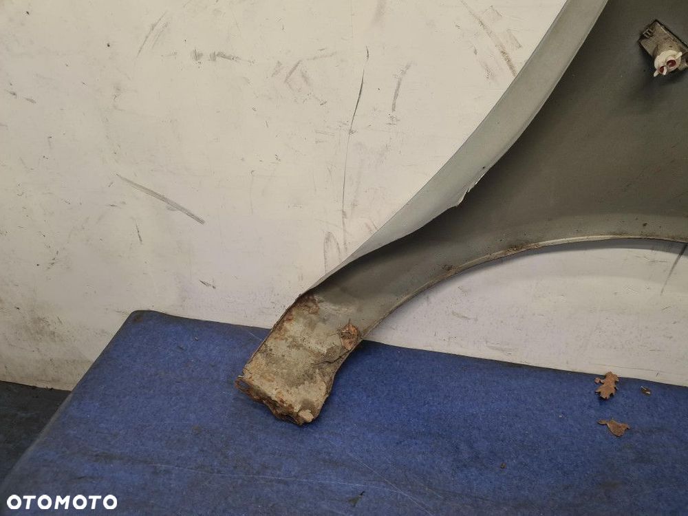 OPEL CORSA D BŁOTNIK PRZÓD LEWY - 7