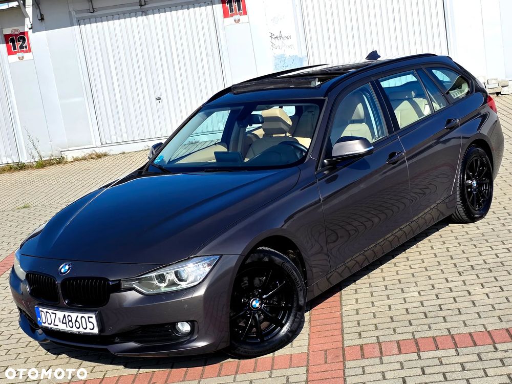 BMW Seria 3 318d DPF Touring Edition Exclusive - 1