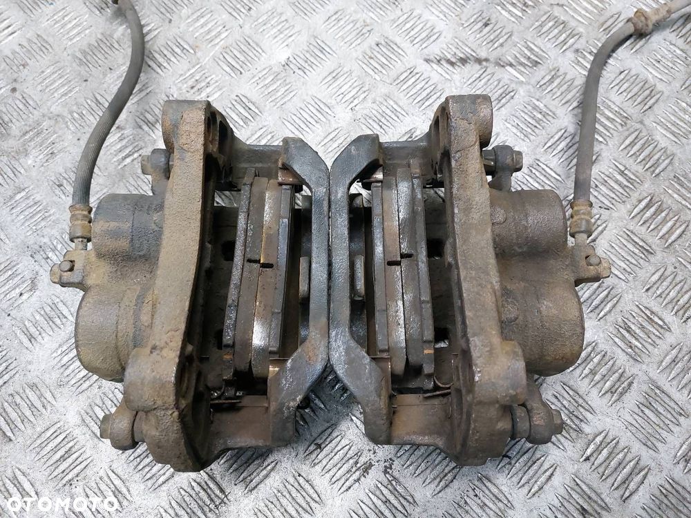 TARCZE HAMULCOWE PRZÓD + ZACISKI RENAULT KOLEOS I 2.0 DCI - 9