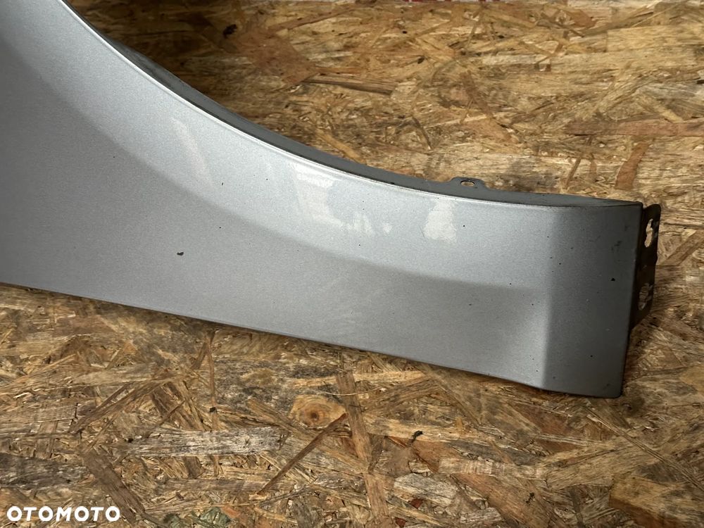 BŁOTNIK PRZEDNI PRAWY OPEL ASTRA IV  ZGEV - 4