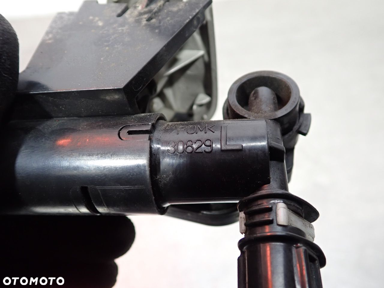 SPRYSKIWACZ LAMPY REFLEKTORA LEWY TOYOTA COROLLA E15 - 7