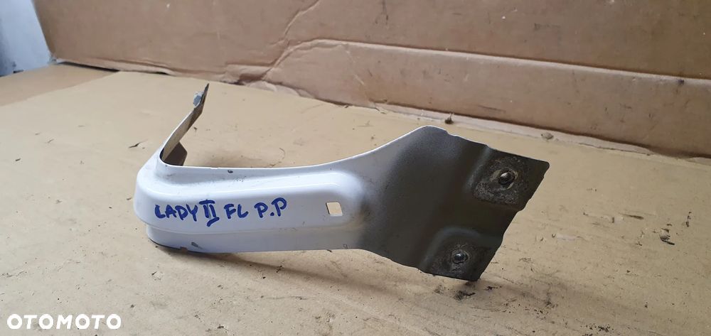 Mocowanie błotnika uchwyt wspornik prawy przód VW Caddy III Lift 1T0821135C LB9A - 3