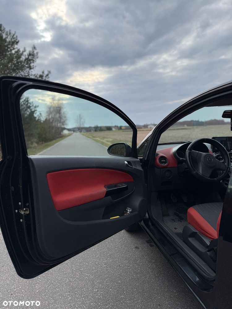 Opel Corsa 1.4 16V Cosmo - 9