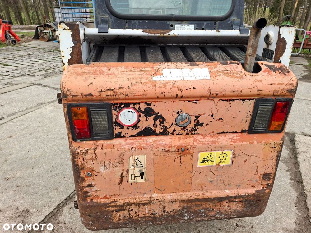 Bobcat 553 4X4 + Melroe Ingersoll-Rand 725S B/H - 29