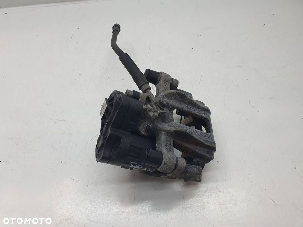 ZACISK HAMULCOWY TYŁ TYLNY PRAWY JARZMO SKODA OCTAVIA IV LIFT 2.0 TDI - 1