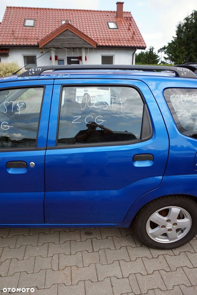DRZWI TYLNE LEWE JUSTY III G3X ZCG  NIEBIESKI SUBARU 2003-2007 - 1