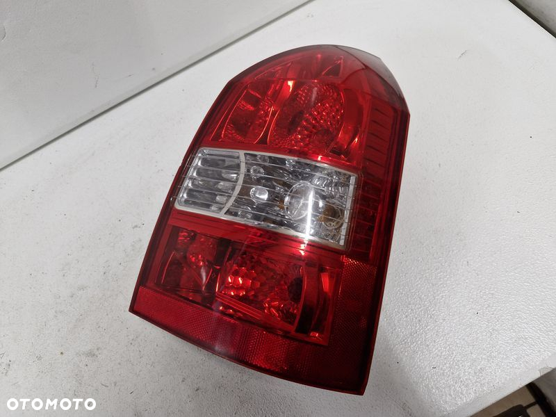 HYUNDAI TUCSON I 1 LAMPA PRAWY TYŁ 92402-2E0 - 2
