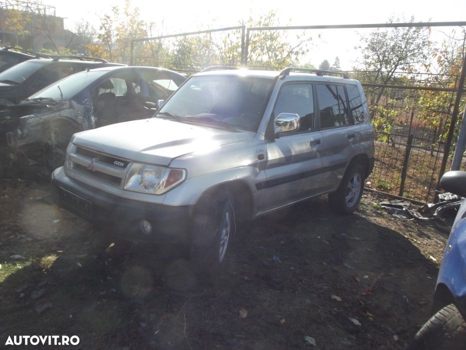 Dezmembrez Mitsubishi Pinin motor 1.8 GDI 2.0GDI cutie manuala 5 usi - 2