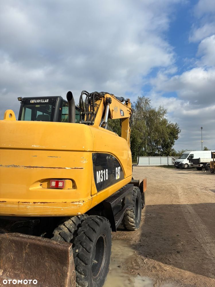 Caterpillar M318C - 5