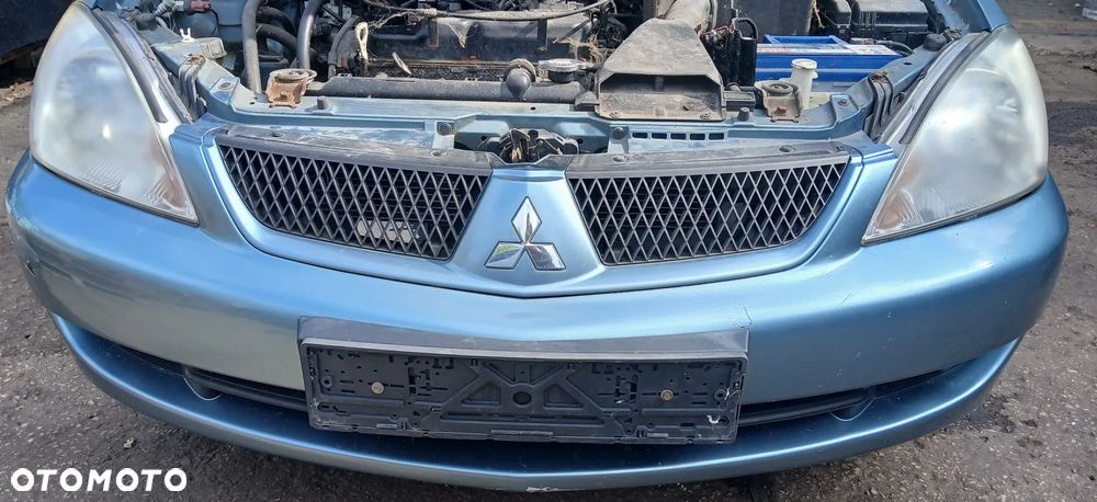Mitsubishi Lancer VII  Zderzak przód przedni grill A86