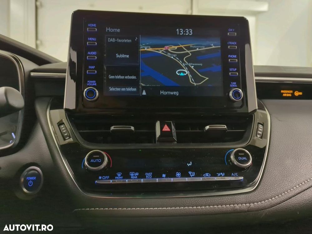 Toyota Corolla 1.8 HSD Exclusive - 11