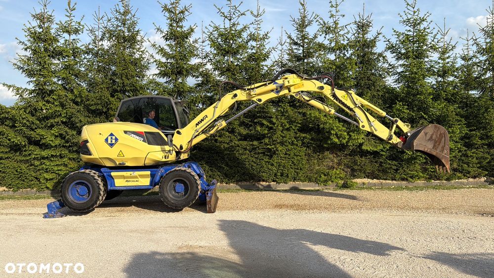 Mecalac Koparka 14 ton MECALAC 15 MWR koparko-ładowarka 3 łyżki widły 1 wł Centr.smarowanie Opony na BLIŹNIAKU 80%Camso ładowarka 714 12MTX 4x4 skrętne KLIMA kabina Premium silnik 146KM volvo EW140B DEUTZ szybka 35km/h - 27