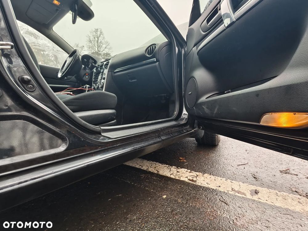 Mazda 6 2.0 Exclusive + - 10