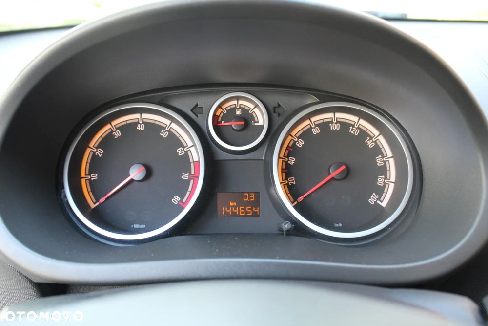 Opel Corsa 1.2 16V Enjoy - 23