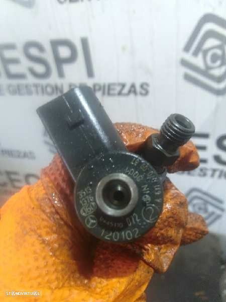 INJETOR KIA CARNIVAL II 2001 -0445110072 - 4