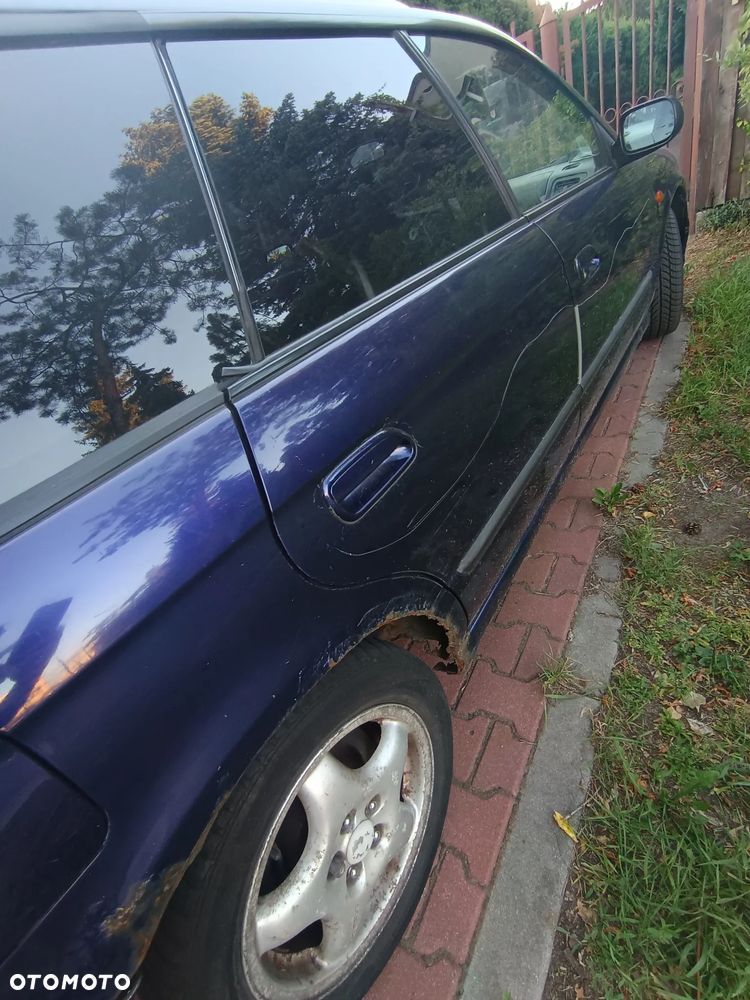 Subaru Legacy 2.0LX 16v 4x4 - 10