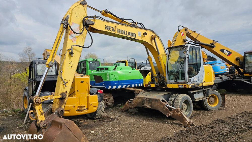 New Holland MH Plus Excavator pe roți - 6