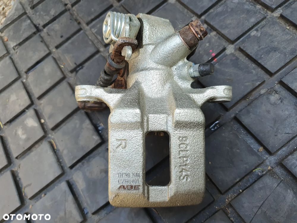 ZACISK HAMULCOWY  PRAWY TYŁ HONDA CIVIC 2001-2005 - 1