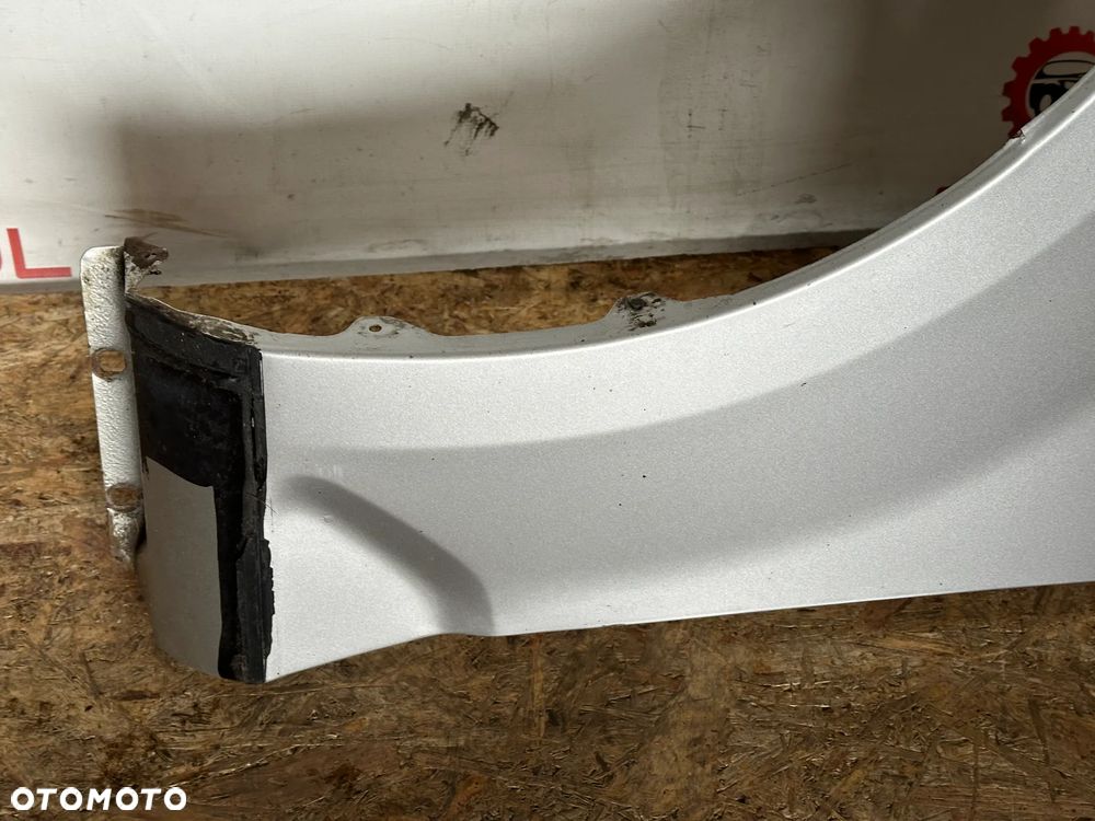 BŁOTNIK PRZEDNI LEWY FORD MONDEO IV  58 - 4