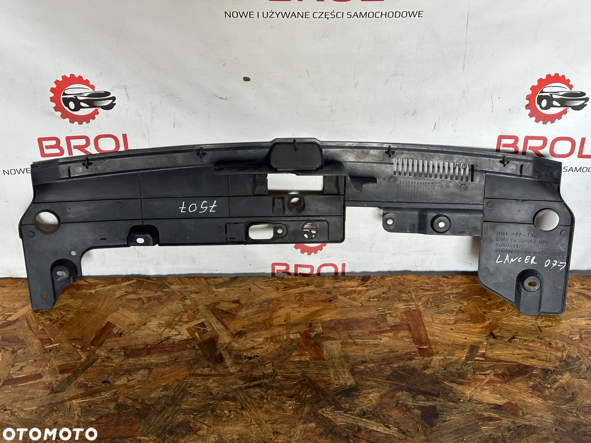 NAKŁADKA OSŁONA PASA PRZEDNIEGO MITSUBISHI LANCER VII 6400A831 - 2